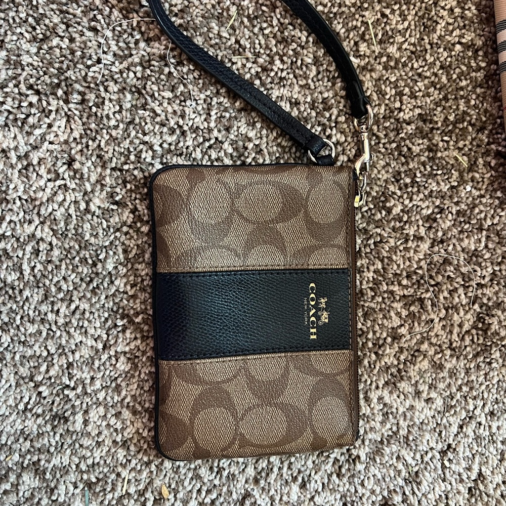 Black and Tan Coach Wristlet